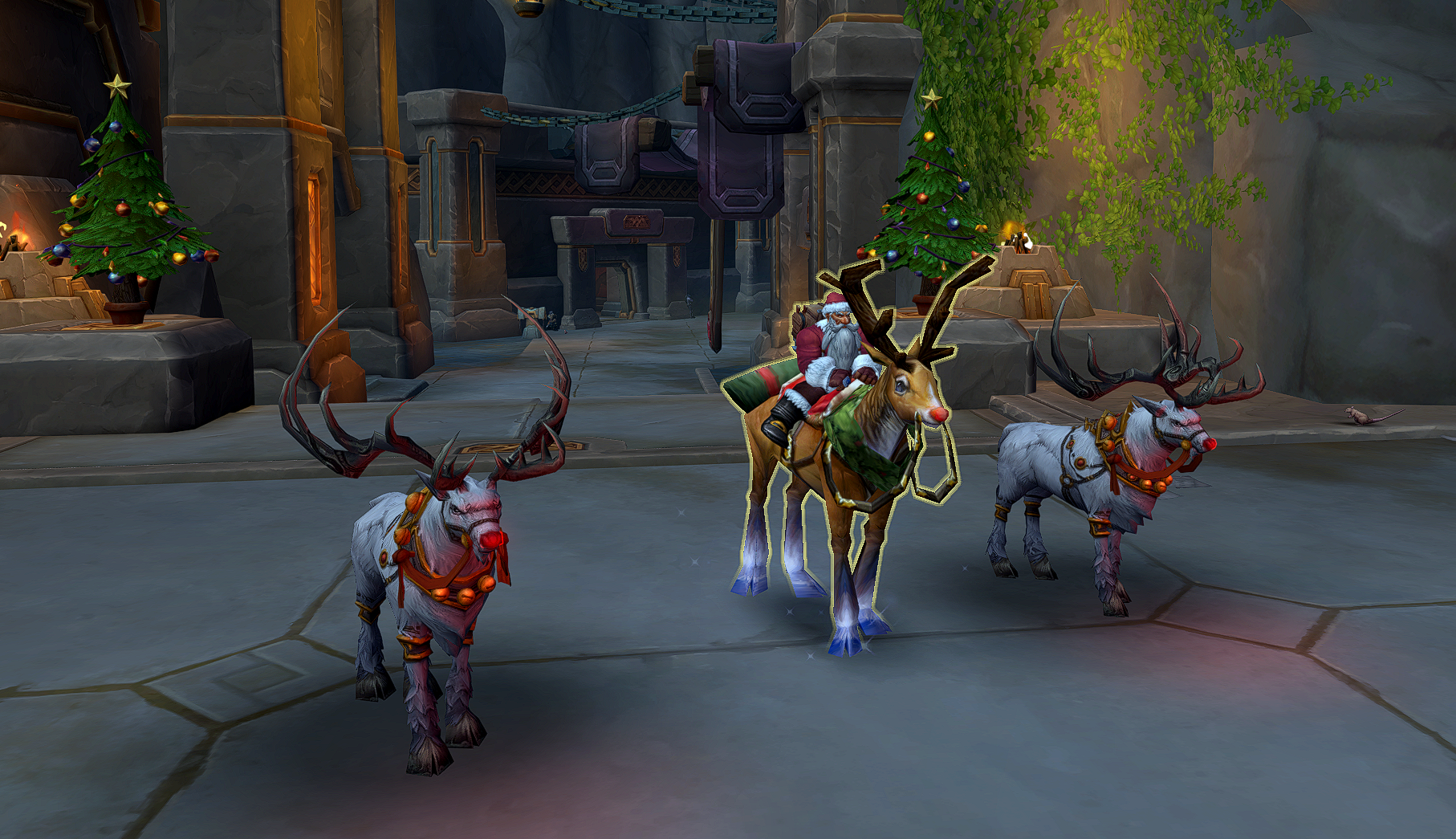 A Warcraft Dwarf sits on a reindeer, flanked by 2 Reindeer pets